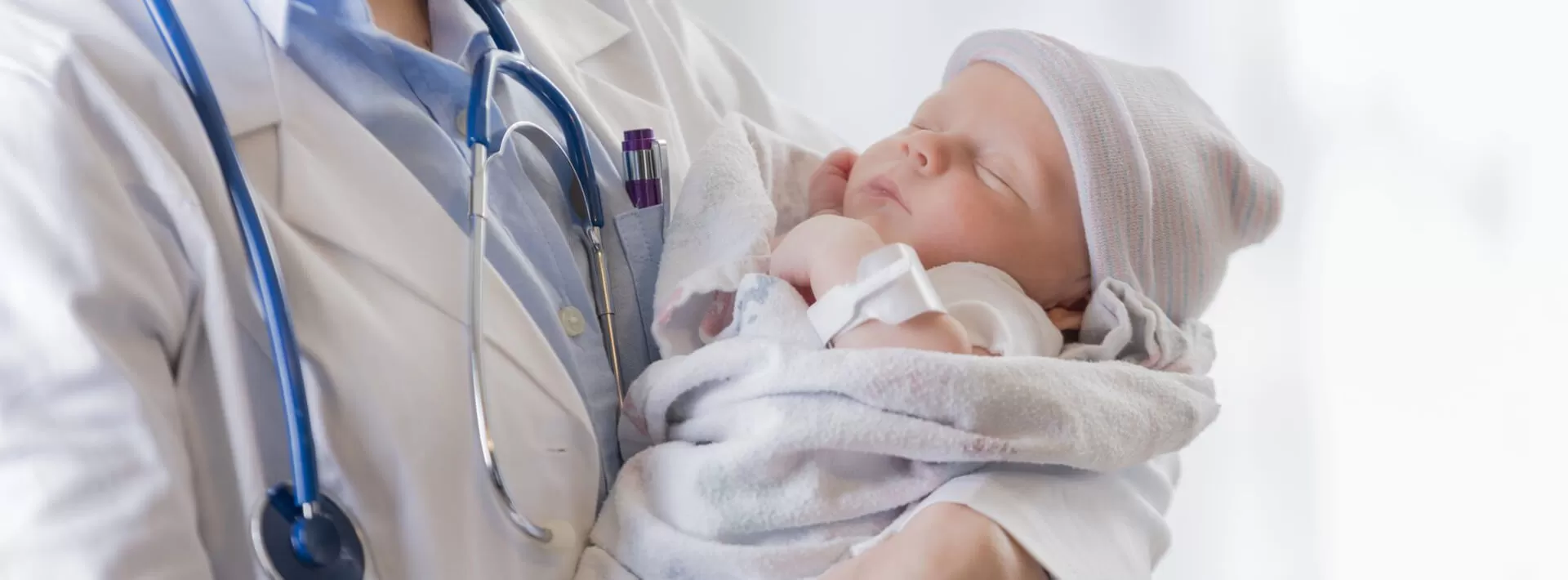 doctor_holding_baby_1920X710_opt.jpg